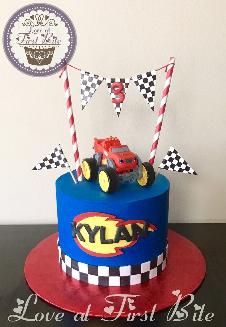 a birthday cake with a monster truck on top