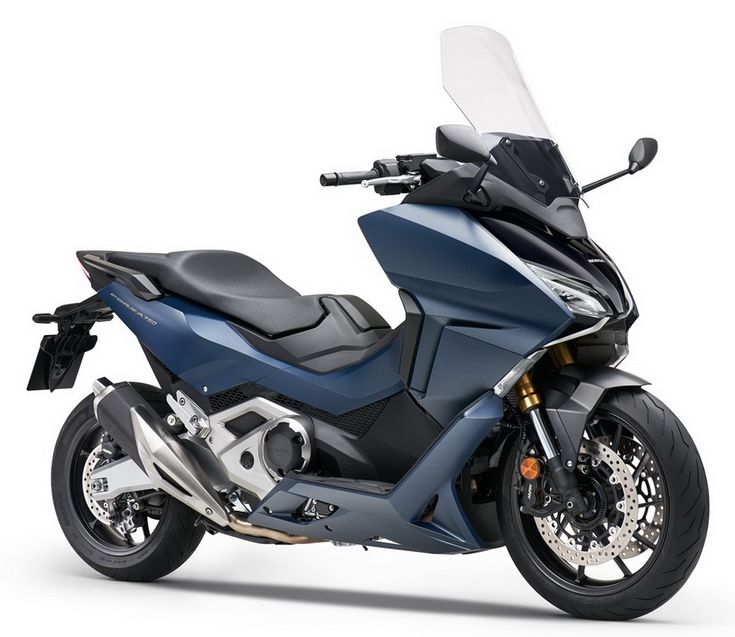 a blue motorcycle is shown on a white background