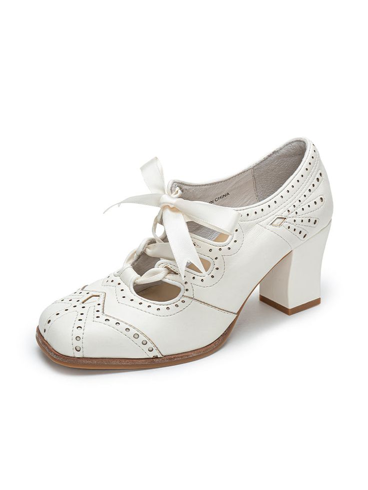 Experience the vintage allure of the 1930s with these Art Deco-inspired Oxford Heels. Designed for those who appreciate timeless elegance, these shoes blend classic sophistication with modern comfort. Crafted from premium soft cowhide leather, they are available in both sleek black patent and elegant ivory, featuring a refined lace-up ribbon closure that adds a touch of charm to any ensemble. These heels are designed with perforated detailing and geometric cutouts that capture the essence of the Art Deco era. The 7 cm (2.76 inches) block heel offers just the right lift, balancing height and comfort, making these shoes perfect for both special occasions and day-to-day wear. The rubber outsole ensures lasting durability, while the pigskin lining and sheepskin insole provide luxurious cushion Retro Block Heel Mary Janes For Formal Occasions, Formal High Heel Dance Shoes For Spring, Elegant Formal Mary Janes With Round Toe, Classic Closed Toe Wedding Shoes, Elegant Low Heel Dance Shoes For Formal Occasions, High Heel Dance Shoes For Spring Formal, Elegant Formal Dance Shoes For Spring, Elegant Formal Spring Dance Shoes, Elegant Spring Formal Dance Shoes