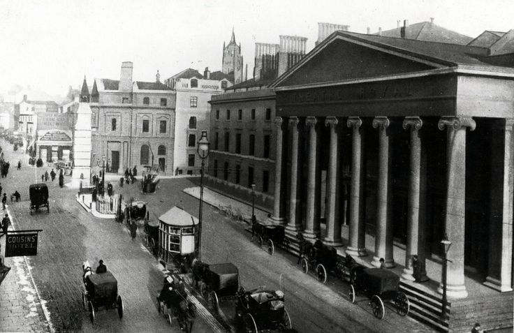 an old black and white photo of horse drawn carriages