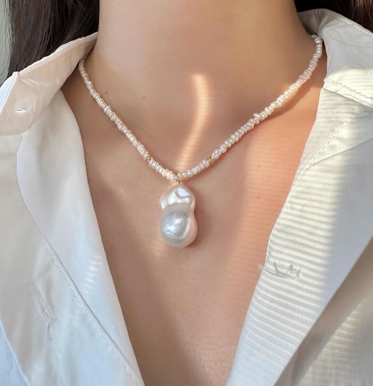 Pure beauty doesn't always need a complex design, and that's especially true for baroque pearls. Each one is uniquely stunning! Choose your one-of-a-kind baroque pearl today  ❣️Important❣️ Each baroque pearl has its own unique shape. Please DM us to select your favorite from the available options. Once you've made your choice, we'll begin crafting your piece. Please note that once created, changes cannot be made. 🤍 MATERIAL 🤍 Freshwater baroque pearls 18k gold plated beads 18k gold - filled ex White Baroque Pearl Long Necklace, Unique White Baroque Pearl Jewelry, Unique Pearl Chain Necklace, Unique Handmade Baroque Pearl Necklace, Elegant Baroque Pearl Shell Necklace As Gift, Handmade Unique Baroque Pearl Necklace, Elegant Baroque Pearl Necklace As Gift, Elegant Baroque Pearl Necklace Gift, Elegant Pearl Pendant Beaded Necklace As Gift