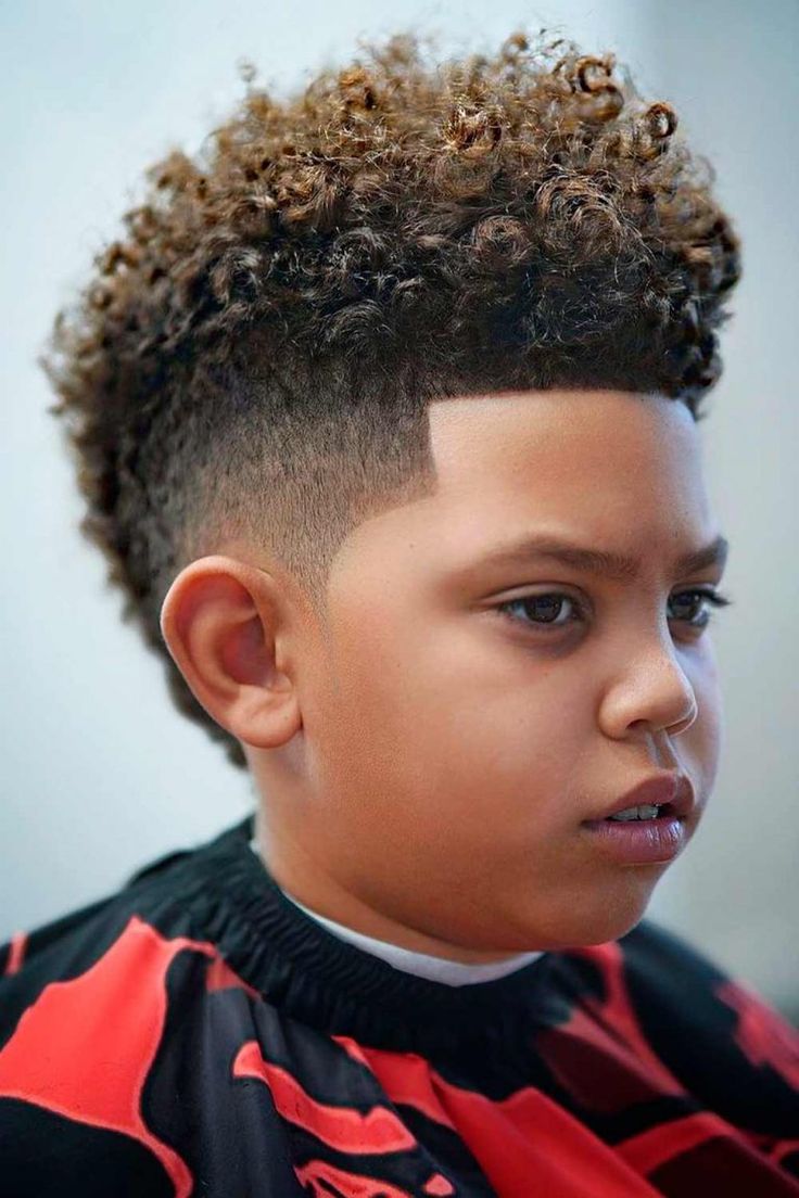 Black Boys Haircuts And Hairstyles (2021 Update) | MensHaircuts.com Mixed Boys Haircuts, High Top Fade Haircut, Boys Haircuts Curly Hair, Top Fade Haircut, Curly Mohawk Hairstyles, Boys Curly Haircuts, Haircuts Curly Hair, Boy Hair Cuts, Boys Fade Haircut