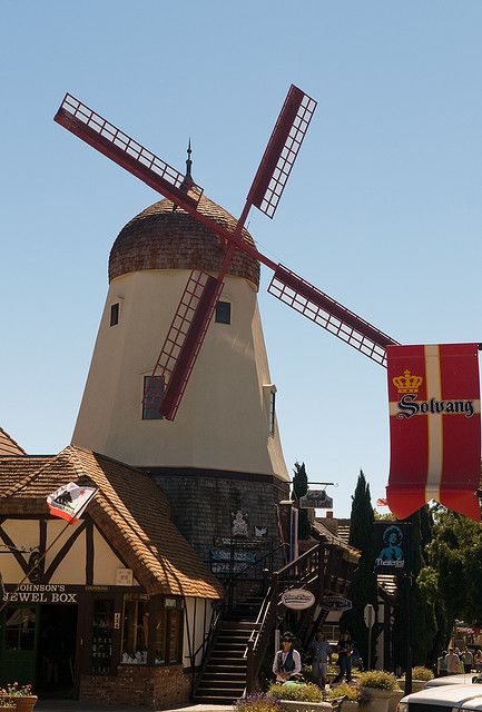 a windmill is in the middle of town