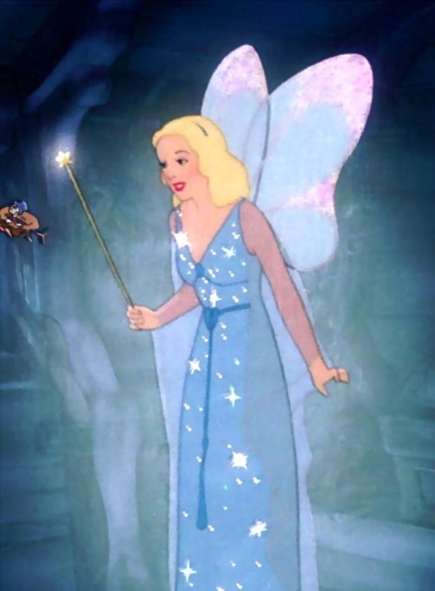 a fairy holding a wand in her hand