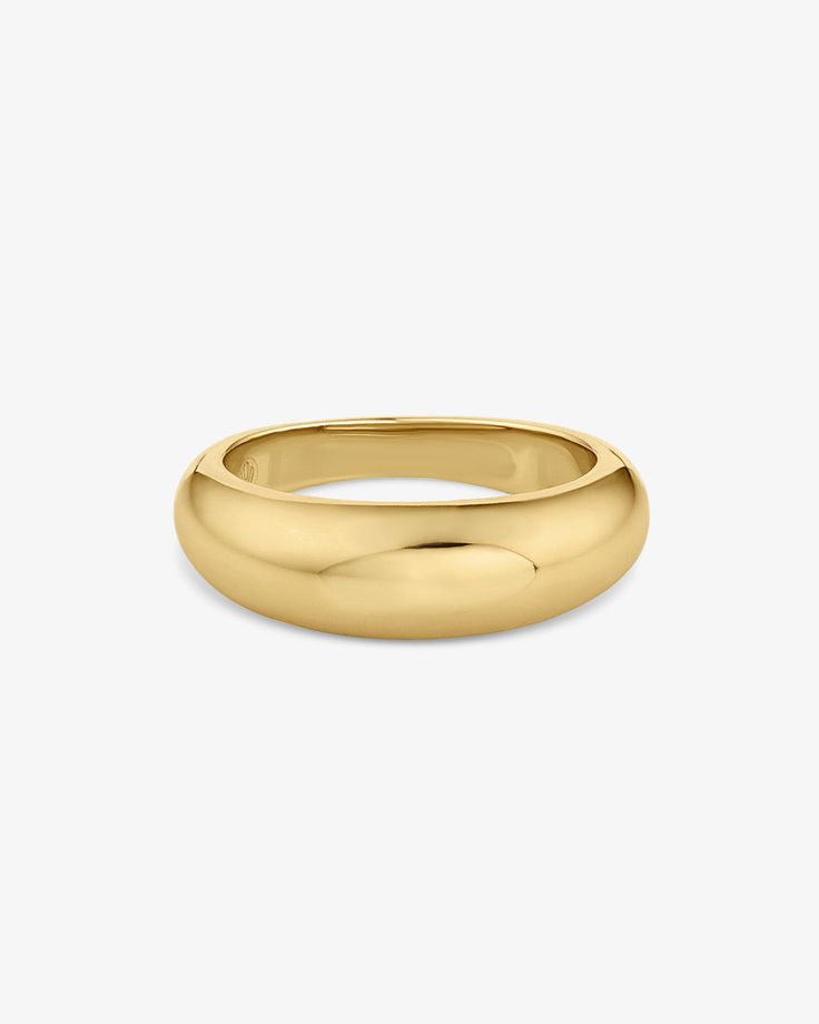 Made in 18K gold over brass Use our Ring Sizer to find your perfect fit Band thickness: 6.5 mm Gold Dome Ring With Smooth Bezel In 14k Gold, Gold Oval Stackable Rings With Smooth Bezel, Gold Open Dome Ring In Recycled Gold, Yellow Gold Thick Band Ring In Recycled Gold, Gold Ring With Smooth Bezel As Gift, Gold Rings With Smooth Bezel As Gift, Gold Rings With Smooth Bezel For Gift, Classic Gold Ring With Smooth Bezel, Gold Timeless Stackable Wide Band Ring