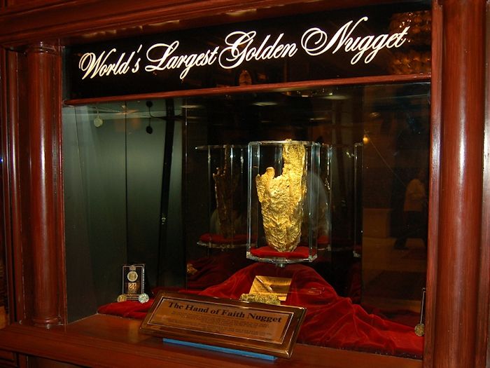 a display case with a golden object in it