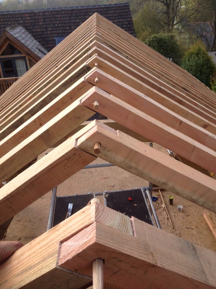 some wood is stacked on top of each other in the process of being assembled and put together