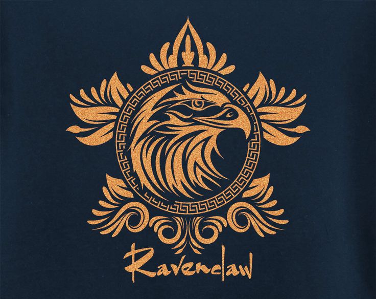 a blue t - shirt with an eagle on it's chest and the word ravenclaw written in gold