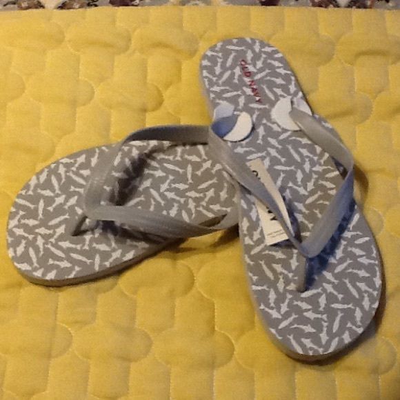 Old navy flip flops Gray and white shark print.  Brand new with tags.  Never been worn.  Size 12-13 Old Navy Shoes Navy Flip Flops, Old Navy Flip Flops, Shark Print, White Sharks, Navy Shoes, Navy Gray, Mens Flip Flop, Gray White, Grey And White