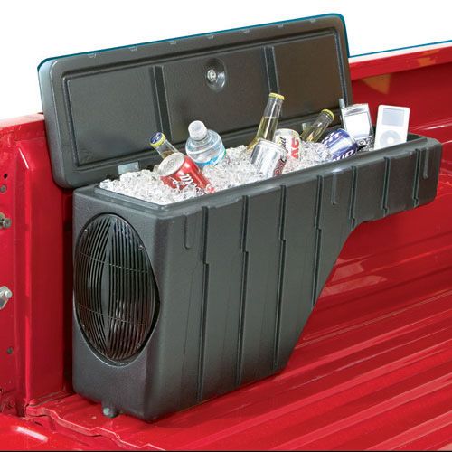 the back end of a red pickup truck with coolers and drinks in it's trunk