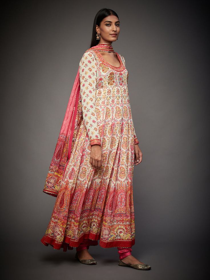 Editor's Note Ecru & Punch Pink Emily Embroidered Kurta With Churidar And Dupatta Color: Ecru & Punch Pink Fabric: Silk, Viscose Care: Dry Clean Only About the DesignerRi Ritu Kumar is one of India’s foremost designers. She has developed a unique style of her own, reflecting the ancient traditions of Indian craftsmanship in a contemporary vocabulary. With a background in art history and museology, which has enriched her horizons, Ritu’s understanding of ancient designs and the innovative use of Semi-stitched Off White Anarkali Set With Floral Embroidery, Embroidered Off White Palazzo Set For Festivals, Cream Anarkali Set With Floral Embroidery For Designer Wear, Traditional Off White Dupatta With Printed Motifs, Off White Anarkali Set With Floral Embroidery, Cream Anarkali With Floral Embroidery, Traditional Off White Long Sleeve Palazzo Set, Bohemian Cream Sets With Dupatta, Bohemian Cream Set With Dupatta