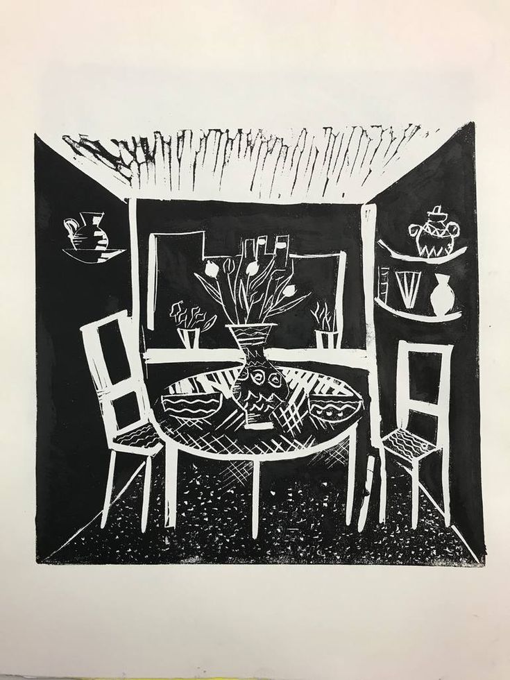 a black and white drawing of a dining room table