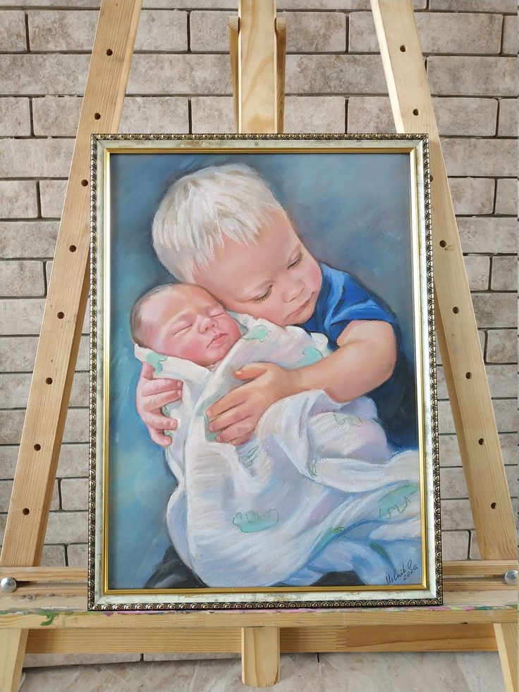 a painting of a young boy holding a baby in his arms on a easel