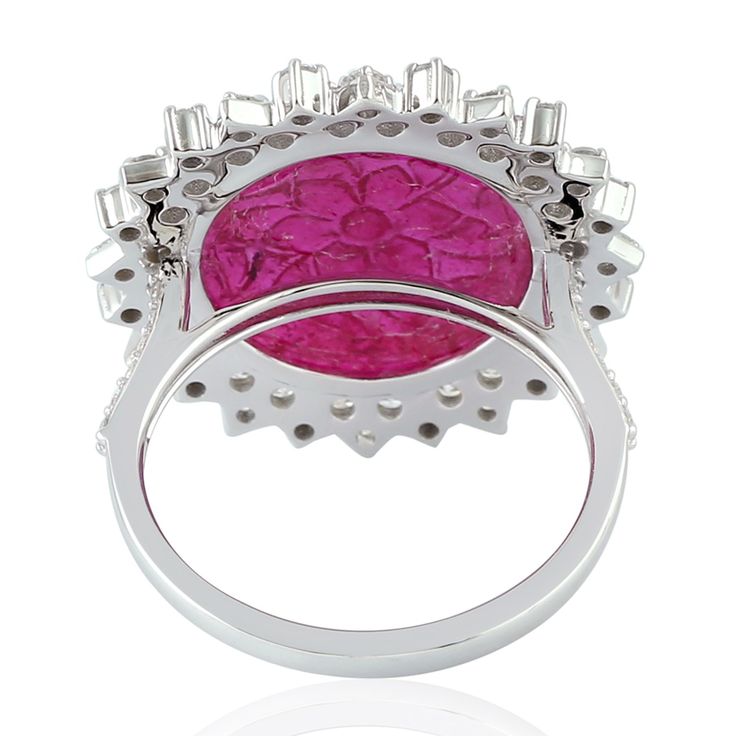 Exuding timeless beauty, this cocktail ring boasts intricate craftsmanship in 18K white gold, adorned with natural diamonds and carving rubies. Resembling a blooming flower, its delicate design evokes elegance and sophistication. A symbol of refined luxury, this ring adds a touch of grace and allure to any ensemble. This Ring is Made In 18k white gold: 4. 884 grams with diamonds: 1. 14 cts and Ruby: 3. 15cts(ING-9070)  This jewelry is made by hand featuring detailed workmanship. Be careful to avoid dropping or banging as physical impacts can result in damage to the pieces including stones falling off. To care for your or jewelry, take caution to keep away from harsh chemicals, Perfume, and Water. You may wipe with a clean polishing cloth to maintain a beautiful shine. Keep in mind that ext Diamond Cocktail Rings, Delicate Design, Ruby Ring, Independent Designers Fashion, Cocktail Ring, Cocktail Rings, Timeless Beauty, Semiprecious Stones, Precious Stones