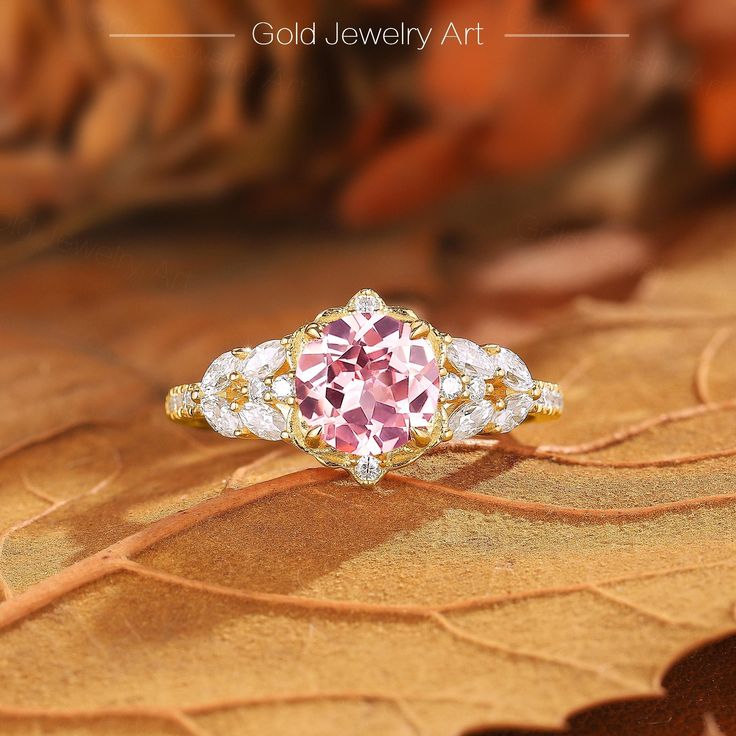 💎 Stone Specifications: 🌟 Main Stone: Pink Sapphire 🌟 Side Stones: Moissanite 🌟 Size of Main Stone: 6.5mm 🌟 Center Stone Carat: 1.5ct 🌟 Cut: Round cut 🔮 Materials Available: ＊ 925 Sterling Silver ＊ 925 Sterling Silver (Electroplated) ＊ 10K Gold ＊ 14K Gold ＊ 18K Gold ＊ Platinum 🎀 Contact us directly to customize your ring size or gemstone - bespoke services available upon request. 🎁 Packaging: Each ring is carefully placed in a beautifully curated gift box, ensuring a luxurious unboxing experience for your special moments. ◆Store Policies: ＊ 30 days Refund Guarantee ＊ Free Shipping ＊ Free Gift Box & Packing ◆Please contact us if you need these services: ＊ Engraving ＊ Metal Change ＊ Ring Resizing ＊ Custom order ◆Processing time: ＊ Items are subject to processing time of approx 1-3 w Wedding Heart Cut Cubic Zirconia Birthstone Ring, Heart Cut Cubic Zirconia Wedding Ring, Exquisite Anniversary Diamond Ring With Accent Stones, Pink Round Topaz Promise Ring, Pink Topaz Promise Ring With Round Shape, Pink Topaz Promise Ring In Round Shape, Wedding Cluster Ring With Accent Stones In Cubic Zirconia, Exquisite Cubic Zirconia Wedding Ring With Accent Stones, Dazzling Sapphire Wedding Ring With Accent Stones