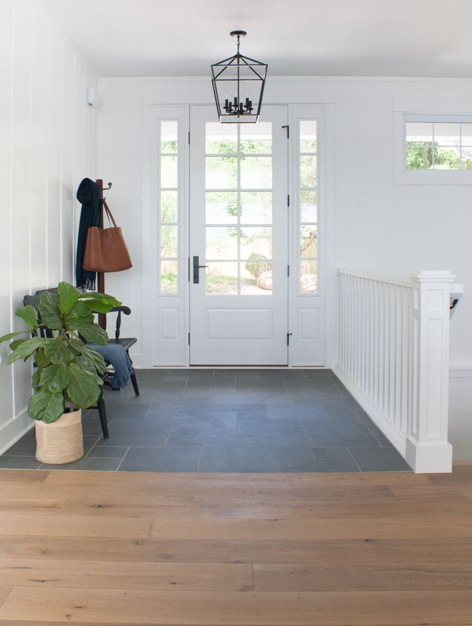 lake house with montauk blue slate tile in the entry, white board and