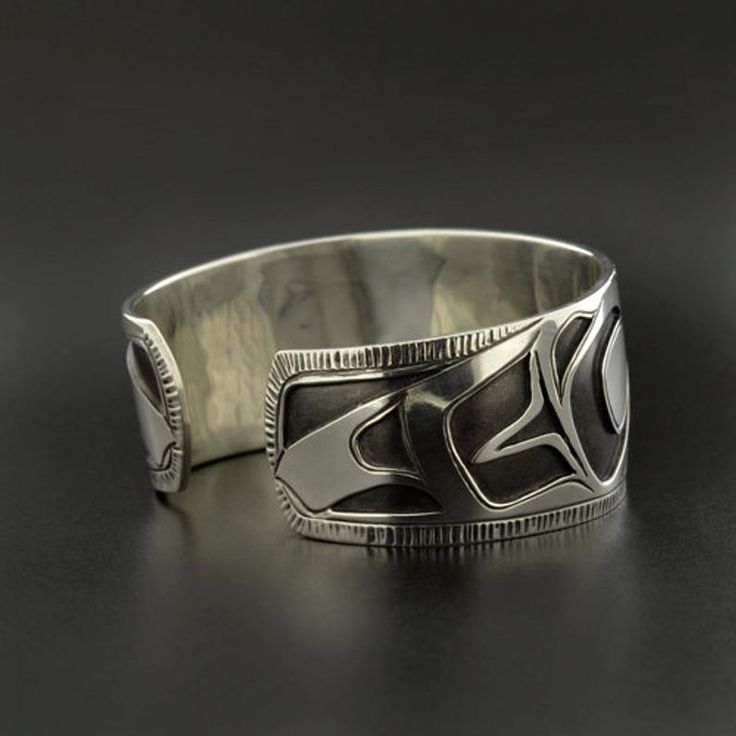 Northwest Coast Overlay Eagle Cuff Bracelet Sterling Silver | Etsy Unique Polished Cuff Jewelry, Unique Round Cuff Bracelet With Polished Finish, Unique Adjustable Cuff Bracelet With Polished Finish, Symbolic Engraved Cuff Bangle Bracelet, Unique Polished Finish Cuff Bracelet Gift, Symbolic Stamped Cuff Bracelet, Unique Polished Cuff Bracelet As Gift, Unique Polished Cuff Bracelet Gift, Symbolic Round Adjustable Cuff Bracelet