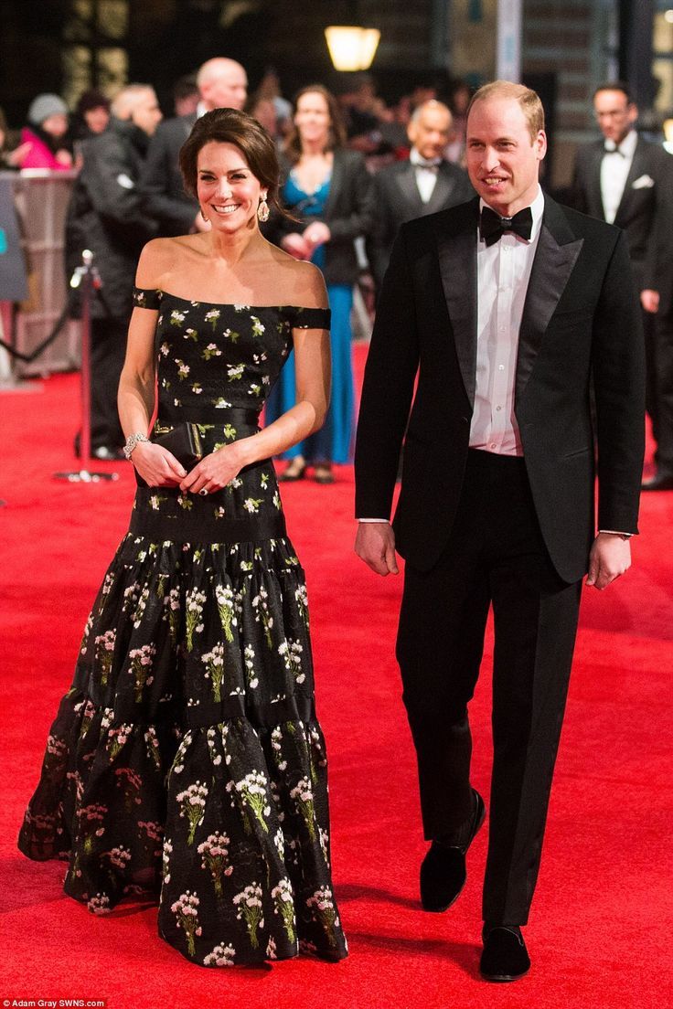 prince william and kate are walking down the red carpet at an event in london, england