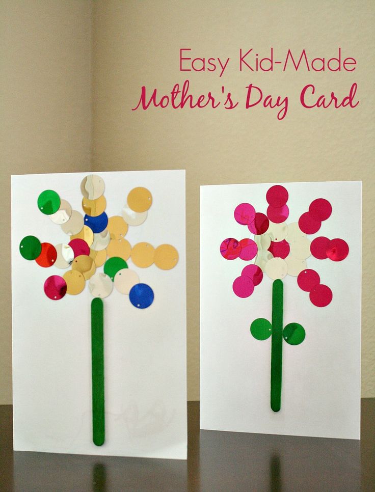 two paper flowers made to look like mother's day cards