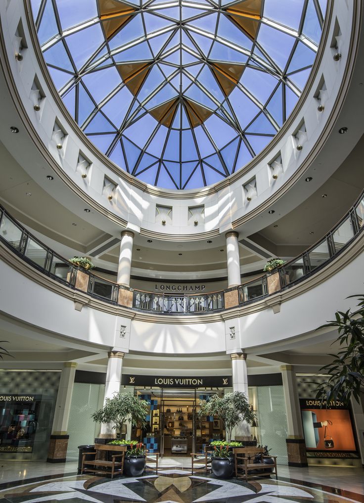 the inside of a building with a glass roof