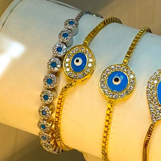 One Pc Sterling Silver Evil Eye With Synthetic Blue Sapphire Stones And Cz Side Stones Bracelet Adjustable Chain Comes In A Beautiful Jewelry Box Blue Sterling Silver Bracelets For Party, Blue Diamond Jewelry With Rhinestones, Adjustable Blue Jewelry With Sparkling Stones, Blue Bracelets With Diamond Accents For Gift, Blue Adjustable Jewelry With Sparkling Stones, Blue Cubic Zirconia Bracelets For Party, Blue Diamond Bracelets As Gift, Blue Cubic Zirconia Bracelet For Party, Blue Diamond Bracelet For Gift