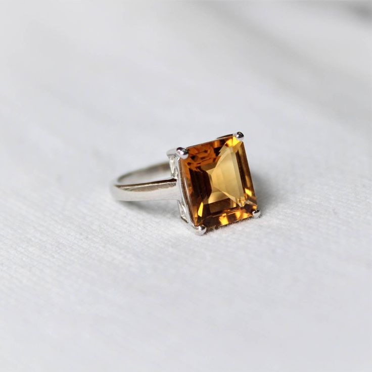 Citrine ring, Sterling Silver ring, cocktail ring, alternative engagement ring, wedding ring, anniversary, birthstone ring, citrine jewelry, Description: Stand out of the crowd with this lovely natural citrine ring on your finger. The design is simple. And adds to the elegance of this beautiful stone. The color of the gemstone is such that it will go well with all attires. I make the gemstones myself for my valued customers so I assure you that the gemstones are Natural and are made from ethical Citrine Topaz Promise Ring, Formal Citrine Birthstone Ring In Fine Jewelry Style, Fine Jewelry Sapphire Ring With Citrine Accent Stones, Citrine Birthstone Ring For Formal Occasions, Classic Citrine Rings With Accent Stones, Formal Fine Jewelry Citrine Birthstone Ring, Citrine Center Stone Topaz Ring, Fine Citrine Jewelry For Promise, Fine Jewelry Citrine Topaz Ring With Accent Stones