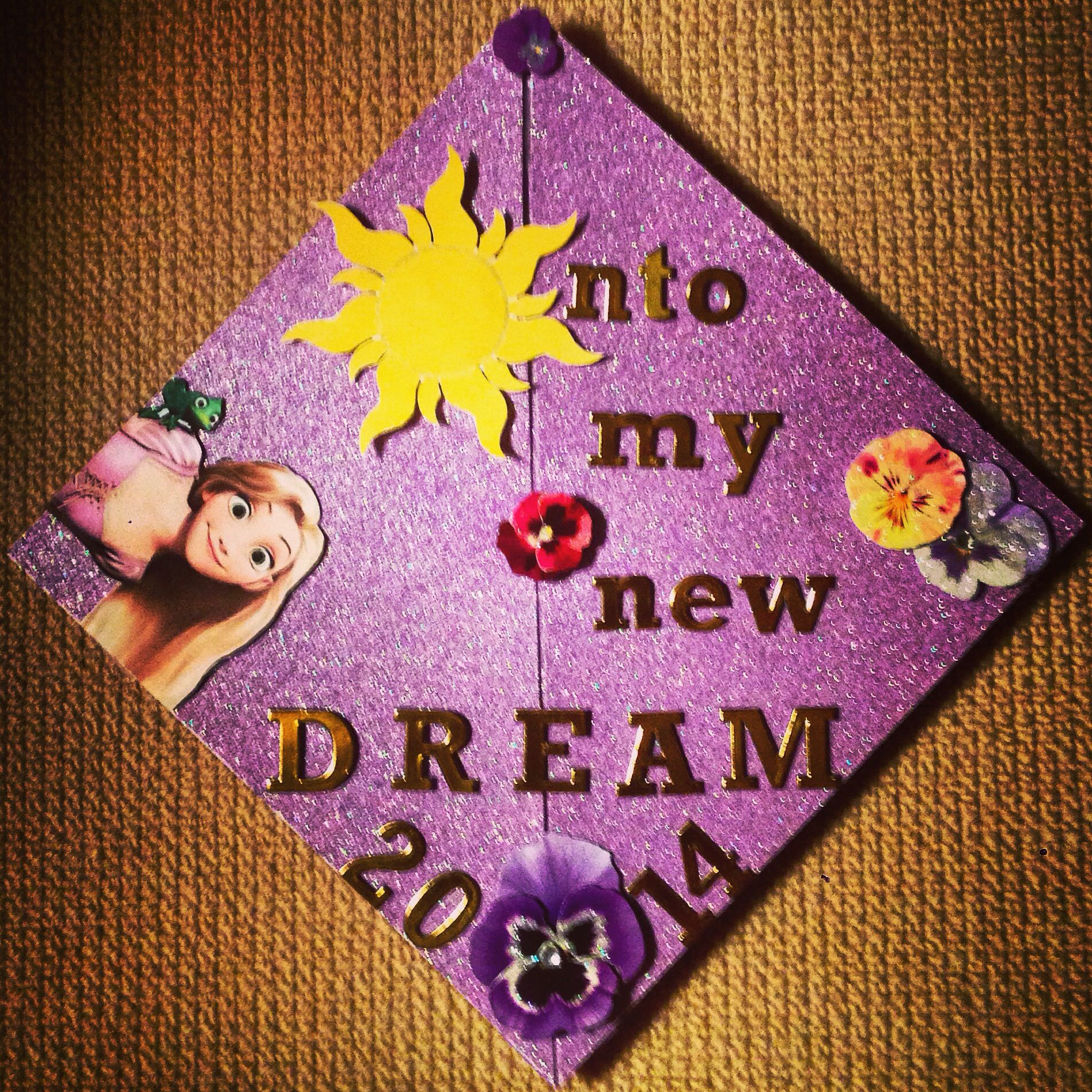 Tangled graduation cap Disney | College graduation cap, Graduation cap ...