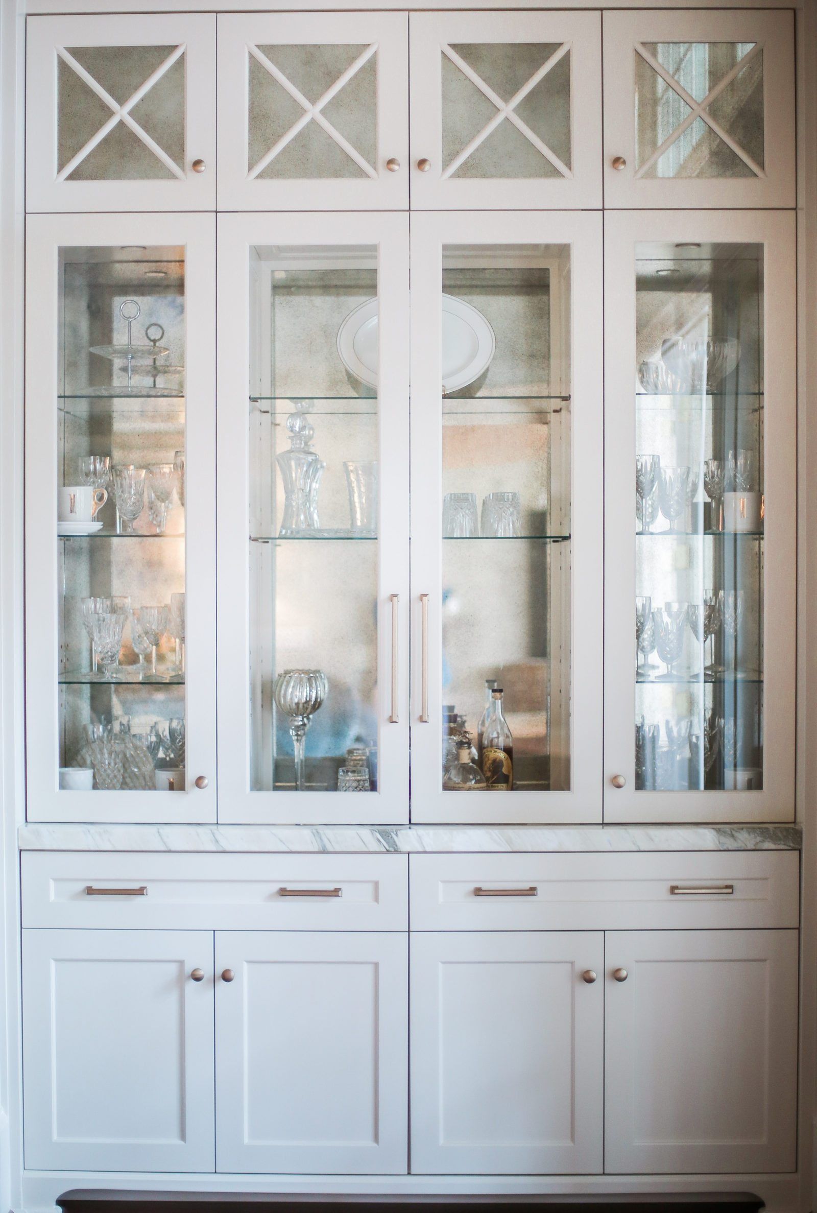 Beyond beautiful dining room storage in white + gold bluegraygal