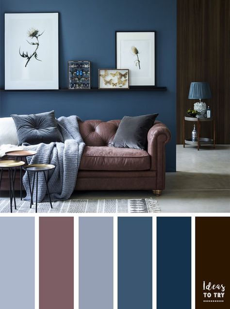 a living room with blue walls, brown furniture and pictures on the wall ...