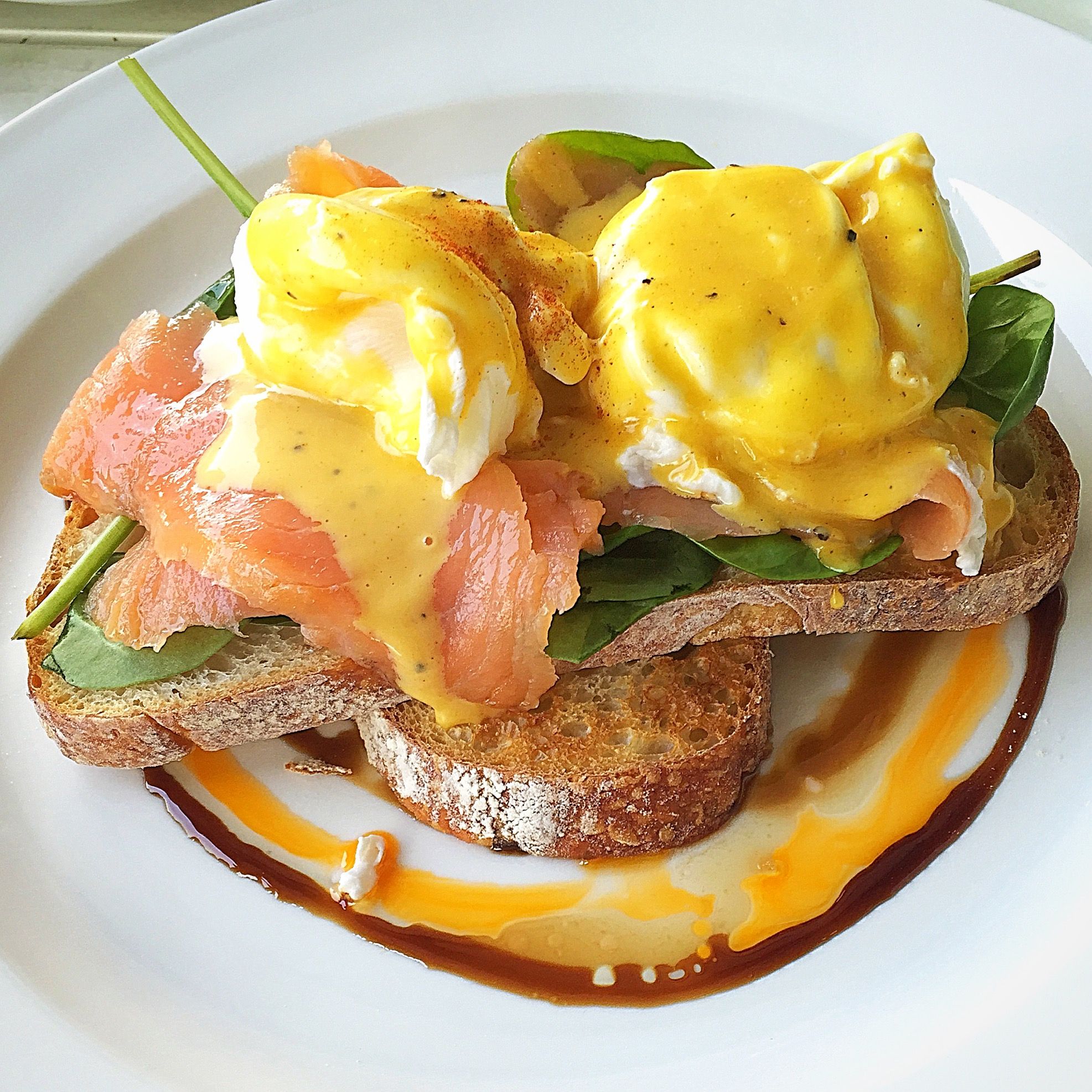 Delicious eggs benedict with smoked salmon on sourdough bread. | Eggs ...