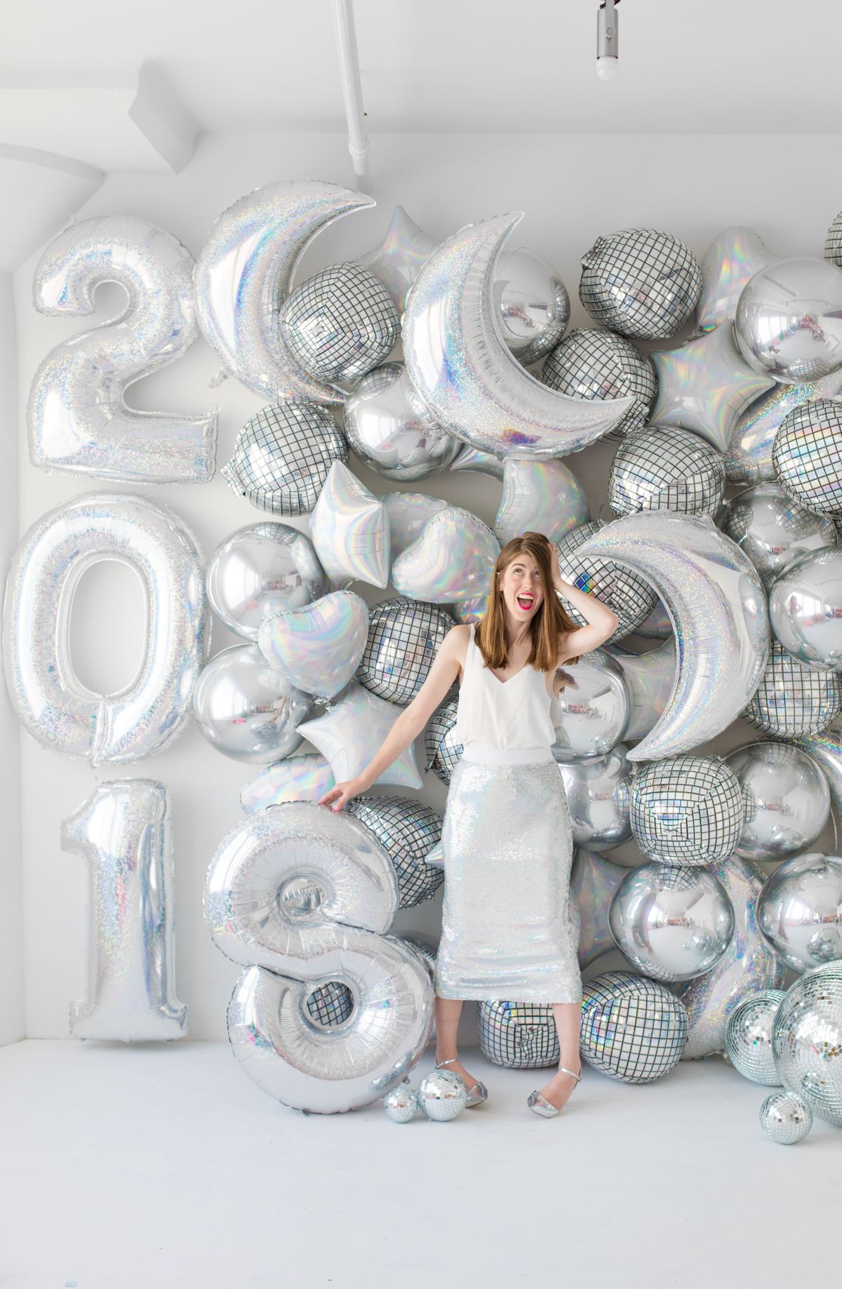 DIY Holographic Balloon Backdrop for New Year's Eve | New year's eve ...