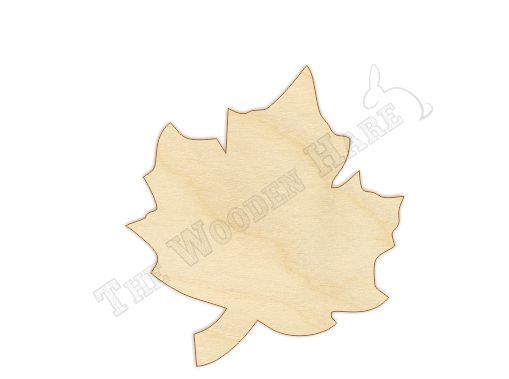 a wooden cutout of an oak leaf