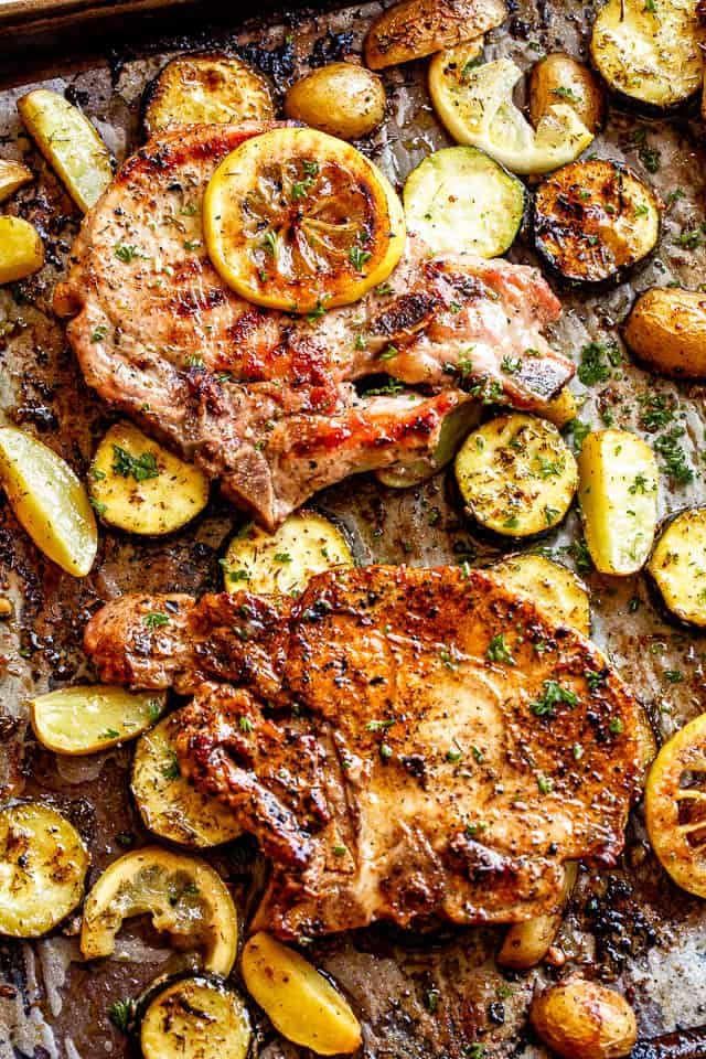 These Baked Pork Chops with Squash and Potatoes are soaked in a lemon ...