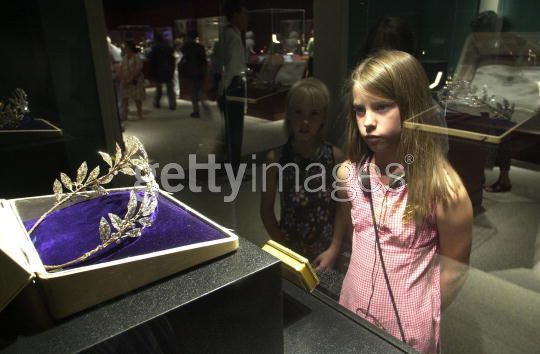 Little Girl Admiring The Faberge Myrtle Leaf Tiara At An Exhibition