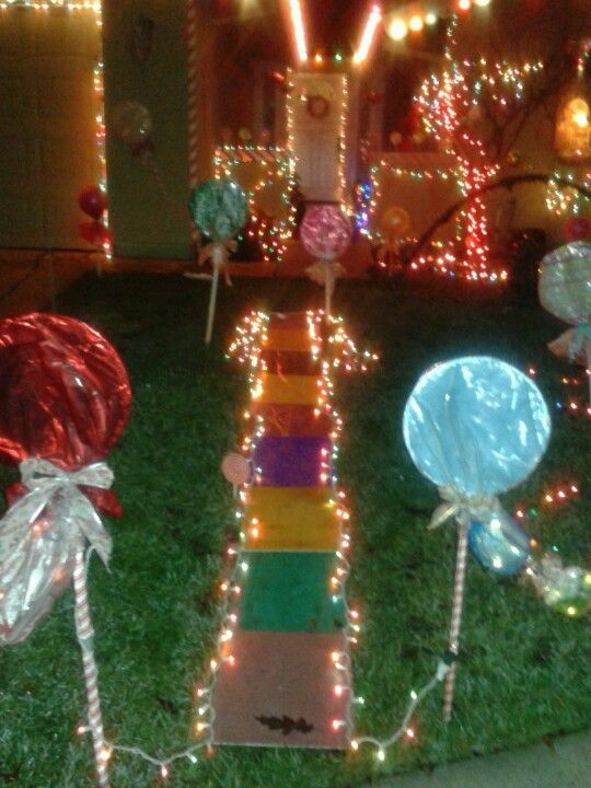 Candyland christmas lights.diy lollipops | Outdoor christmas tree ...