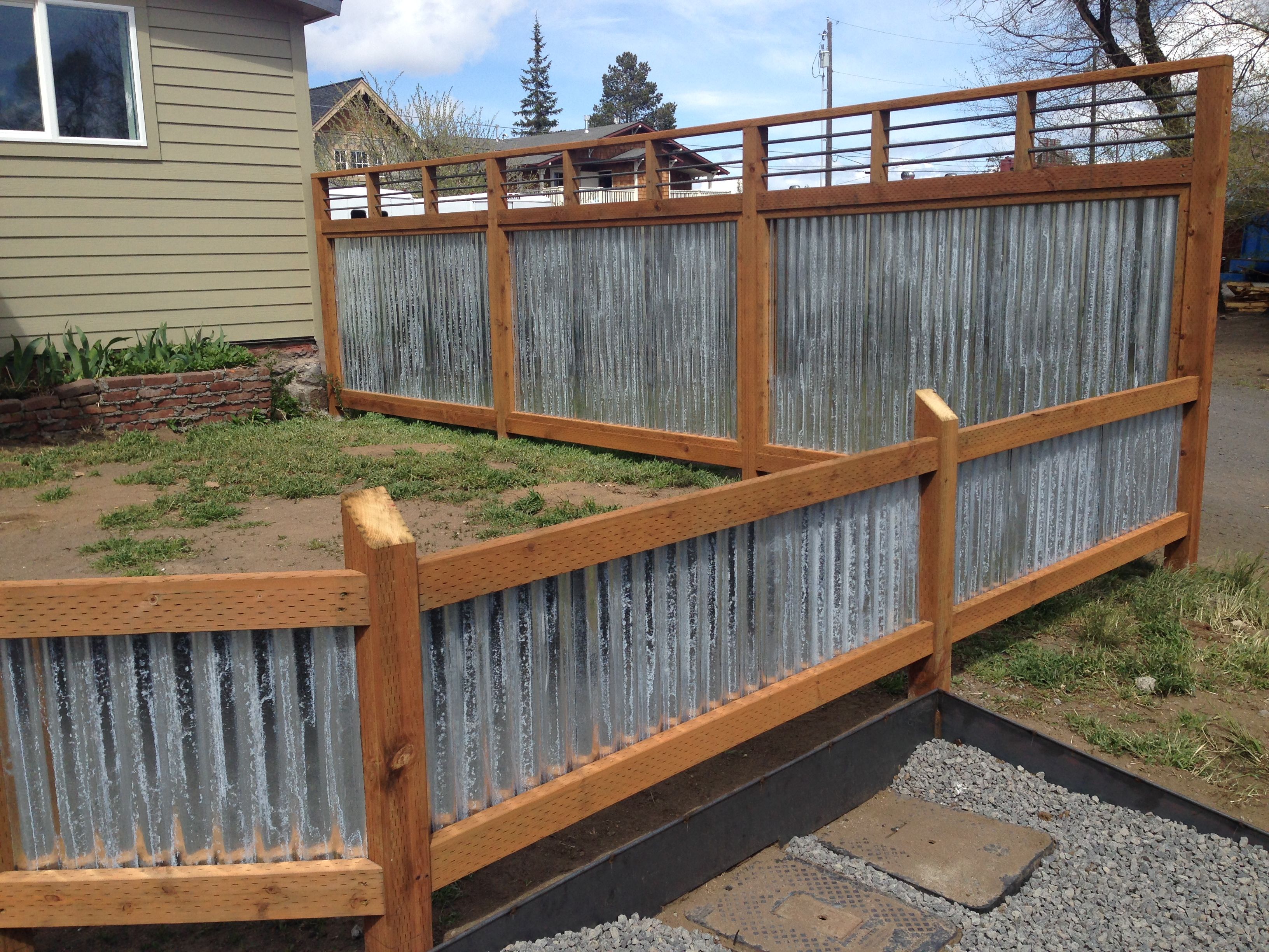 Corrugated metal and rebar | Diy privacy fence, Corrugated metal fence ...