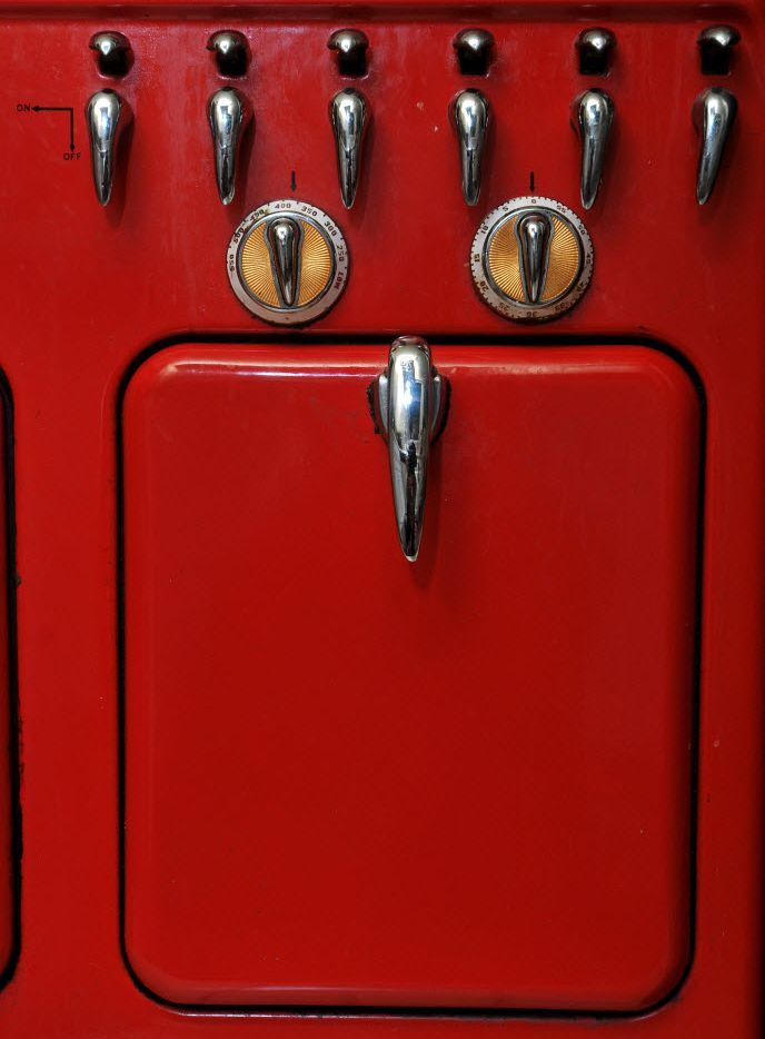 Vintage 1950s Red Stove with Chrome Knobs in Dallas Homes