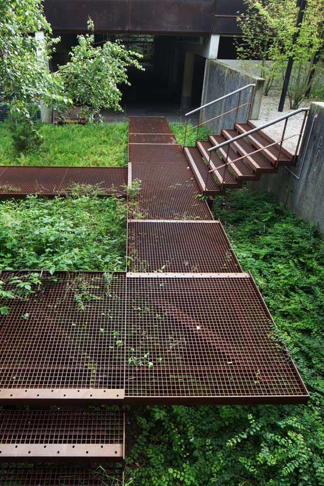 catwalk in the kitchen garden. walkway and steps made of black metal ...