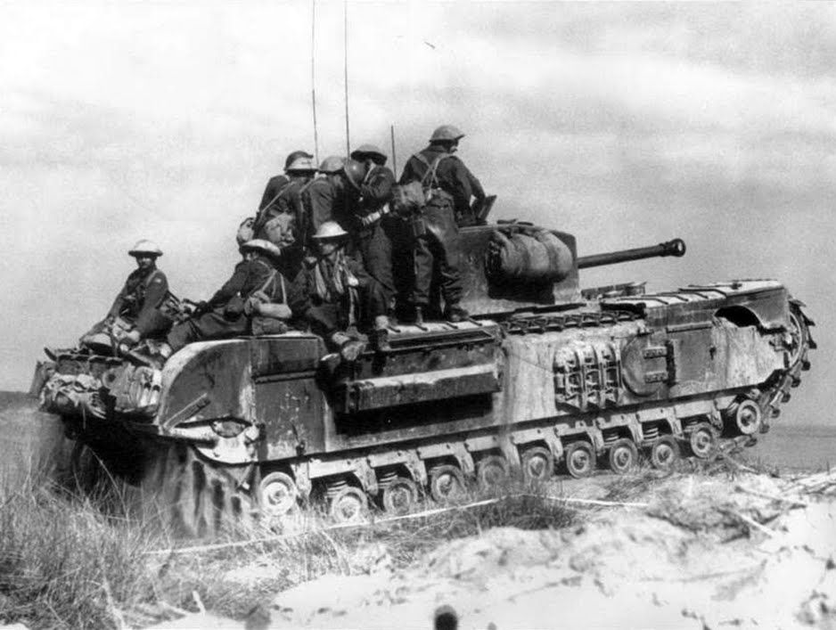 A Churchill tank in the North Irish Horse VII, carrying troops of the ...