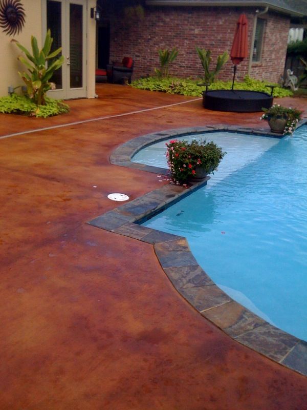 stained concrete pool deck | Concrete patio, Concrete stain patio, Pool ...