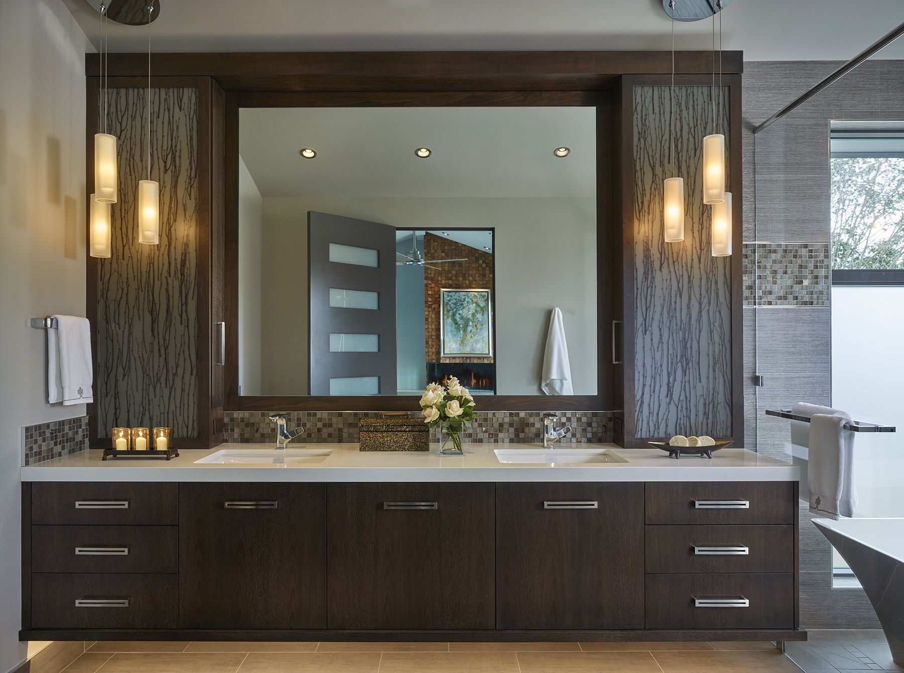 Master Bathroom featuring floating vanity lit from below and resin