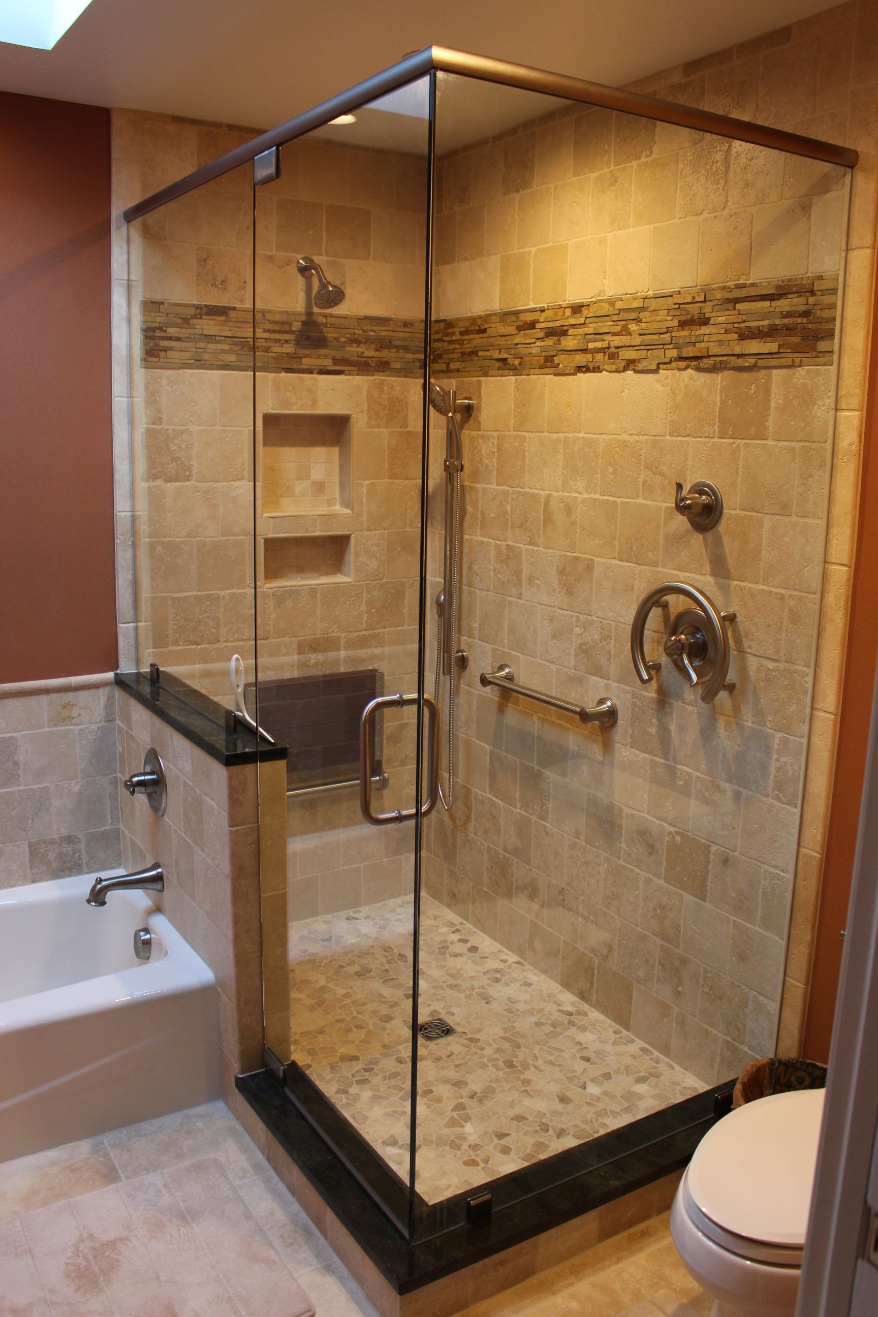 Travertine shower  bath  surround and heated floor field 