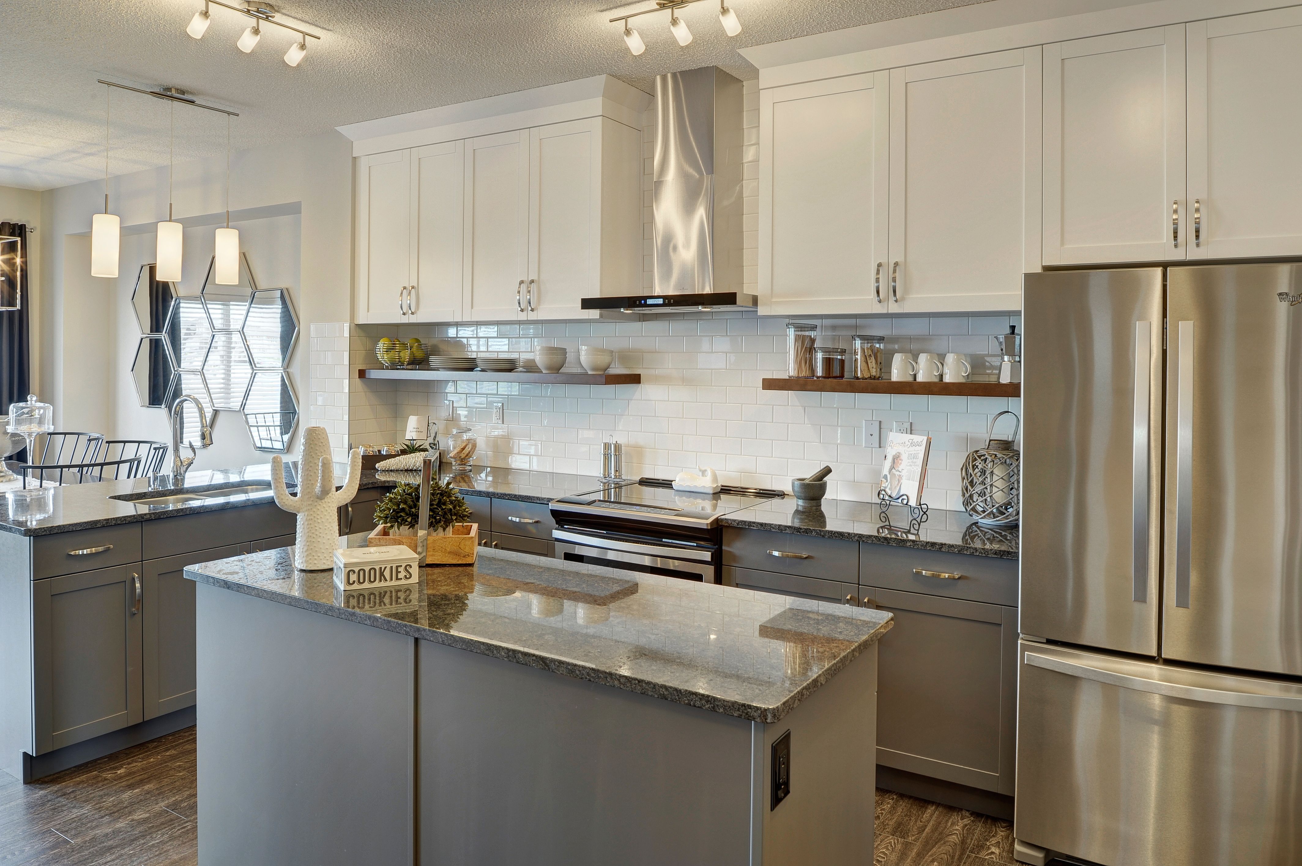 Two toned in tuxedo style kitchen. White upper with