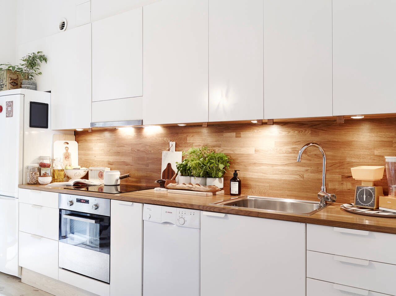 Butcher block countertops + backsplash // Contrast with white Kitchen