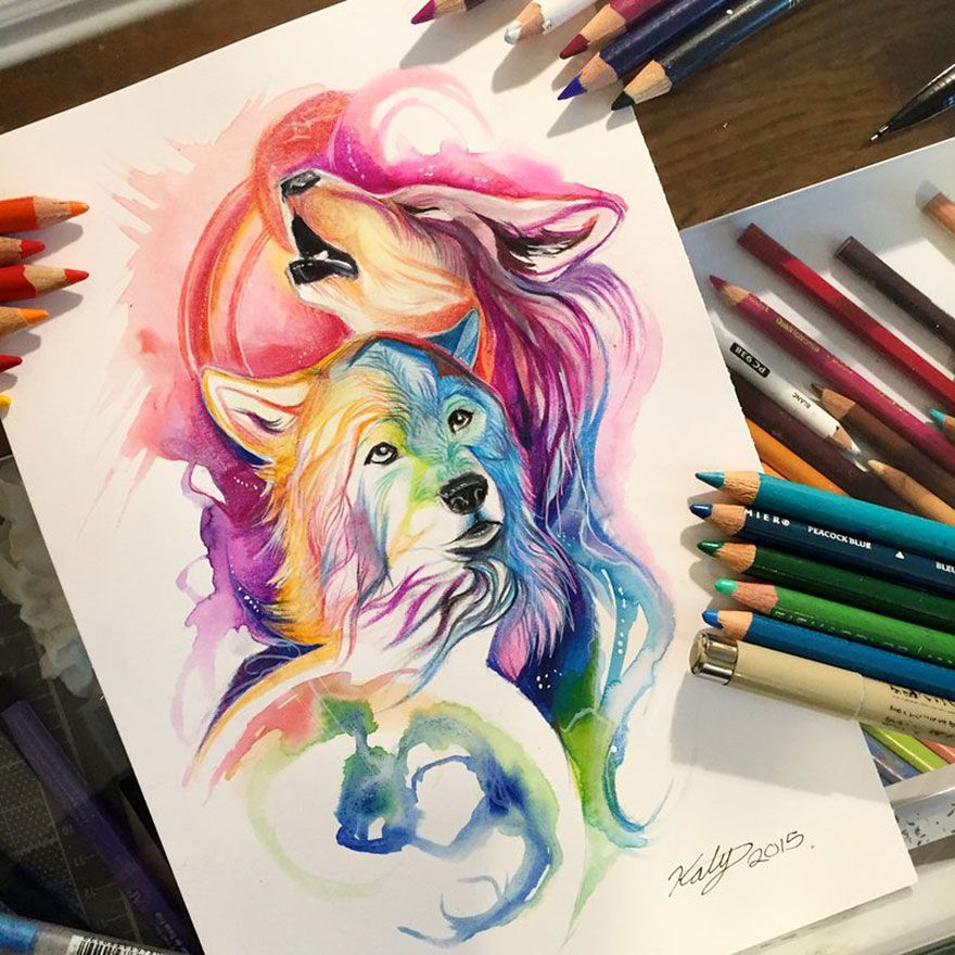 a drawing of two wolfs with colored pencils next to them