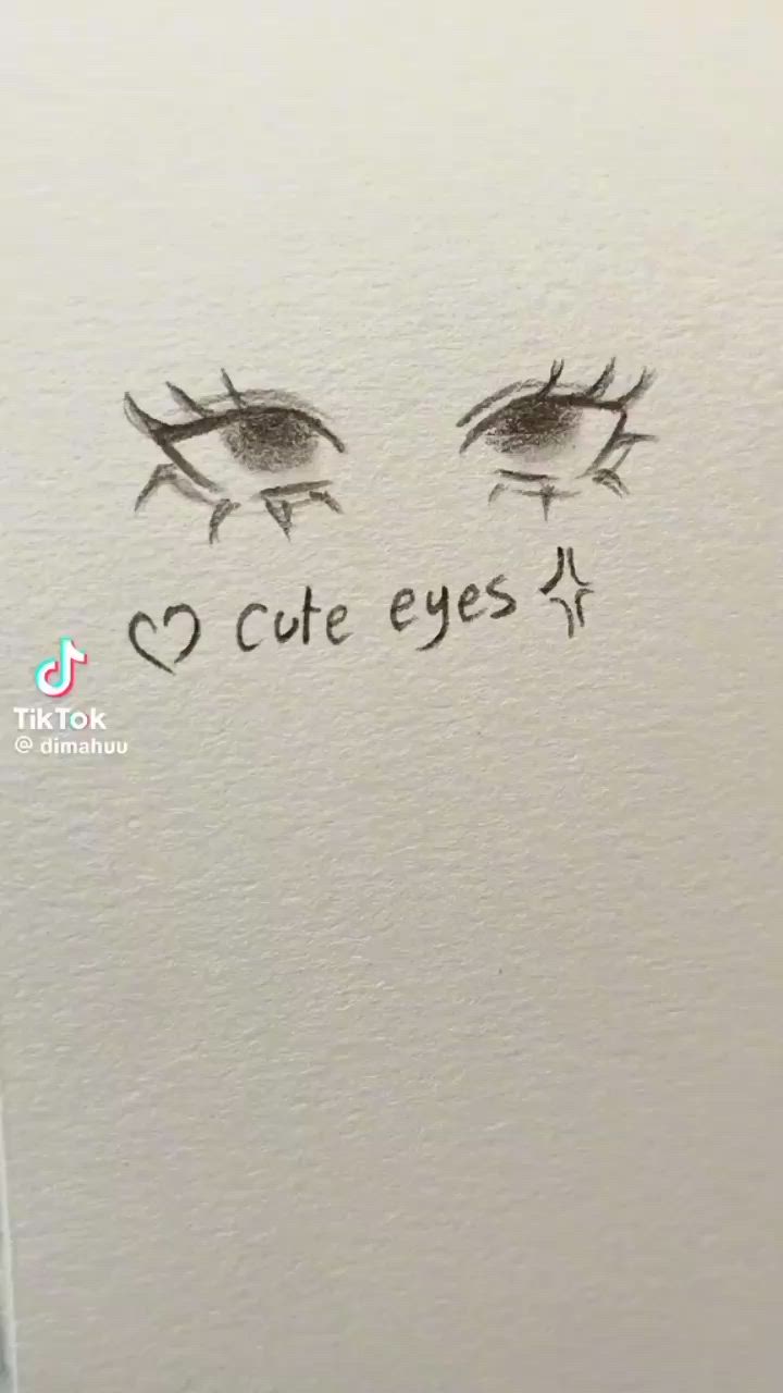 This may contain: an eye drawn on top of a piece of paper with the words love eyes written below it