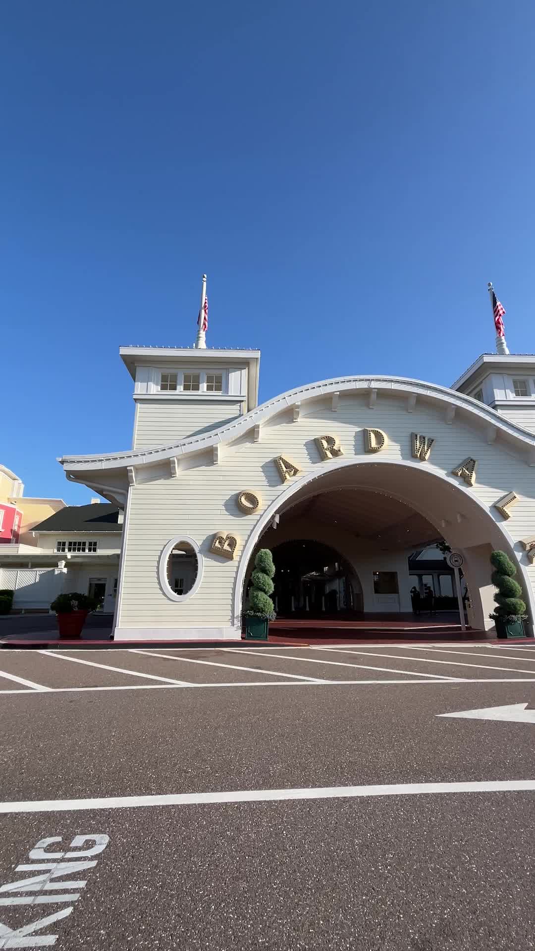 This may contain: the entrance to disney vacation at walt world