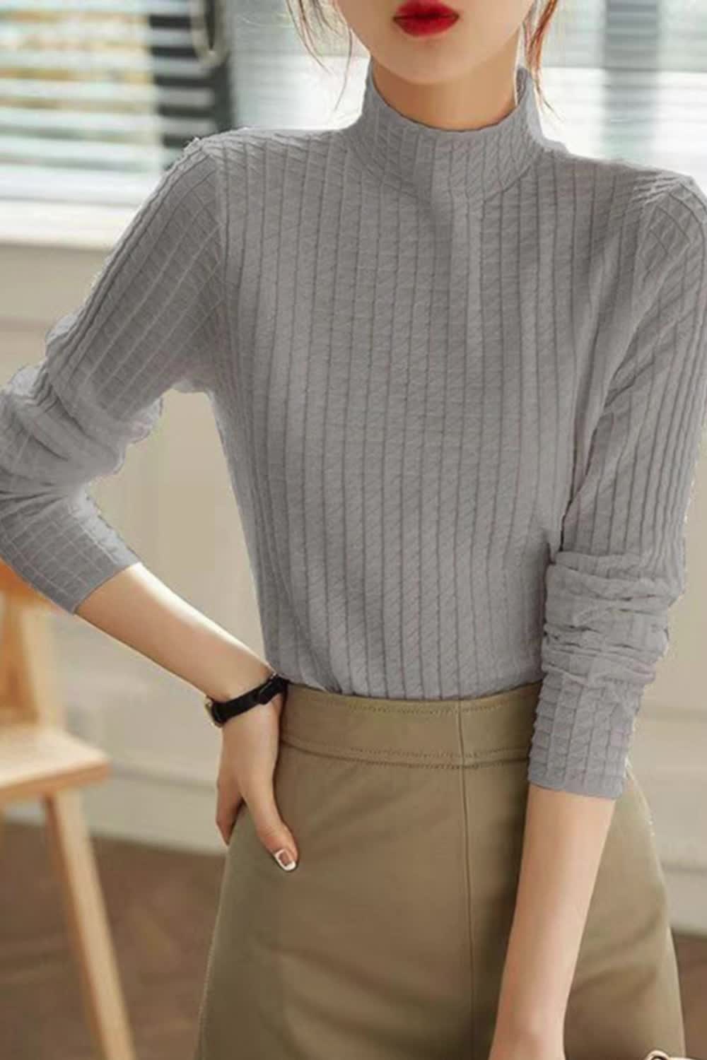 This contains: Upgrade your winter wardrobe with our Women Turtleneck Plaid Sweater Pullovers. Designed for the colder months, this slim-fit sweater offers both style and warmth. Made from high-quality materials, it provides a comfortable and snug fit. Perfect for casual or formal occasions, the basic solid design adds versatility and elegance to any outfit.