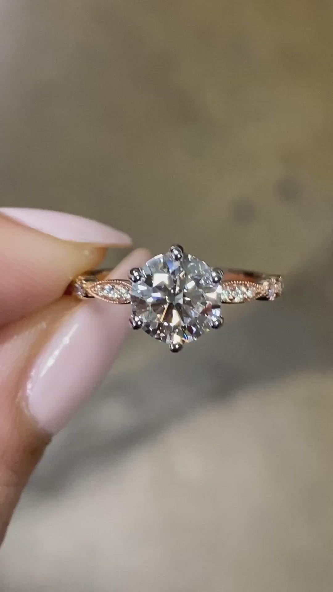 Our client requested something classic - timeless, but full of personality and uniqueness. Together we created this beautiful ring with tons of vintage feel and bright sparkle illuminating from the round diamond we sourced for this special project. Drop-down diamond options represent our recommended grade, which maximizes size for value, while maintaining eye-perfect clarity and giving you a colorless look. For other diamond options, see our Shop Diamonds tab or speak to one of our design consul