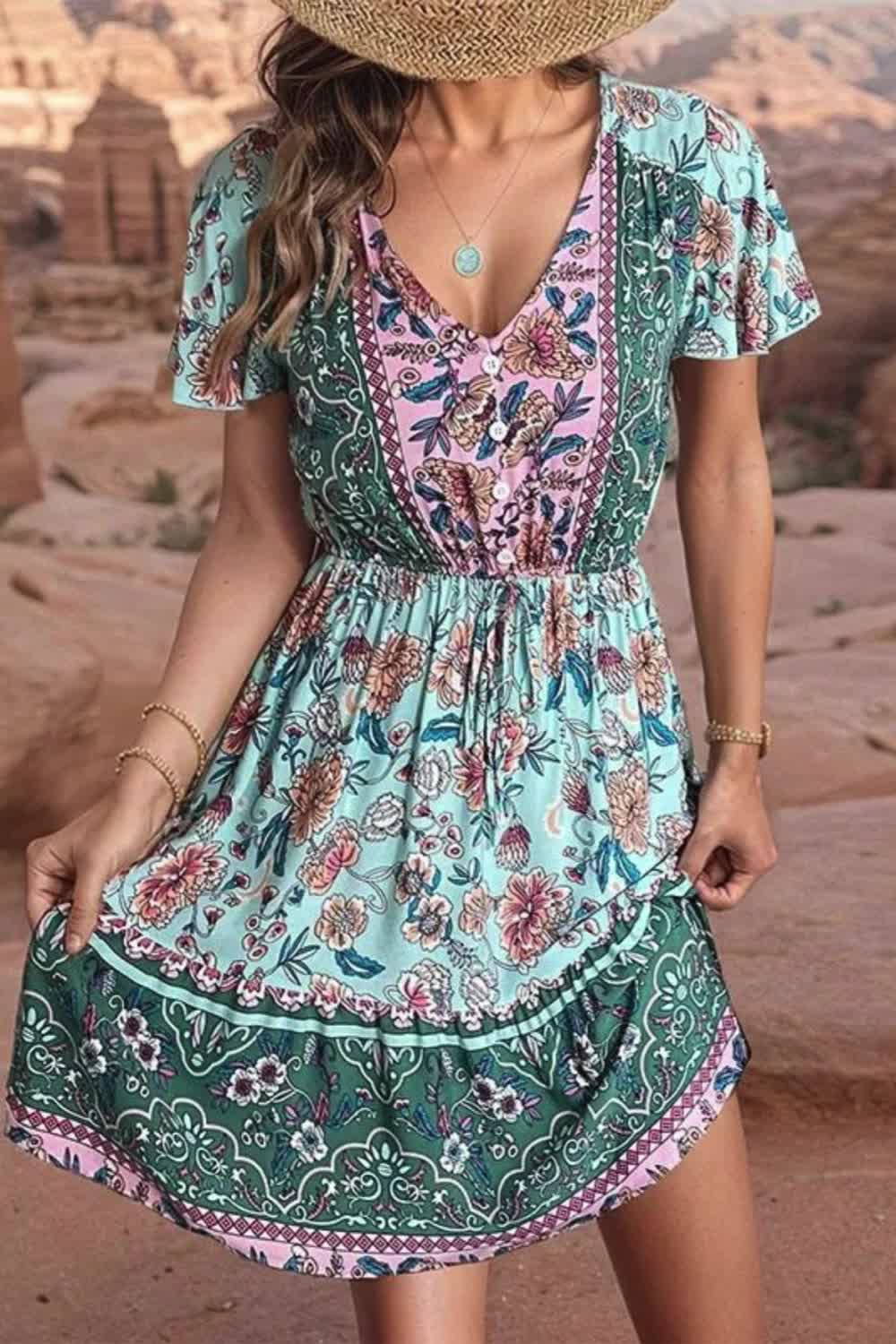 "Elevate your summer wardrobe with this Women's Floral V-Neck Mini Dress. With its charming floral print, short sleeves, and beach-ready style, it's perfect for holiday getaways. Embrace effortless elegance and enjoy the sun in this versatile dress, ideal for beach days or casual outings."